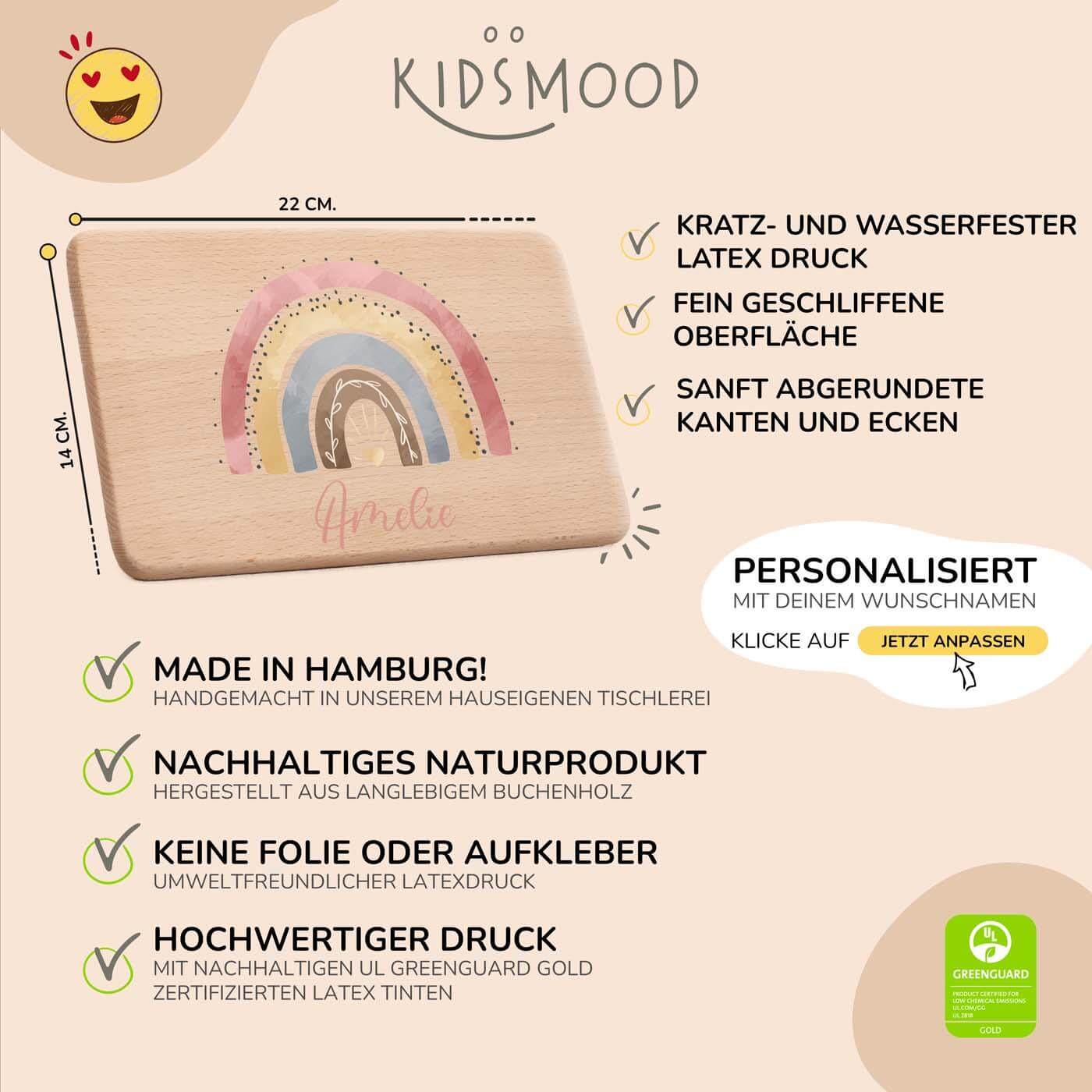 detailansicht der gravur auf dem frühstücksbrettchen mit regenbogen