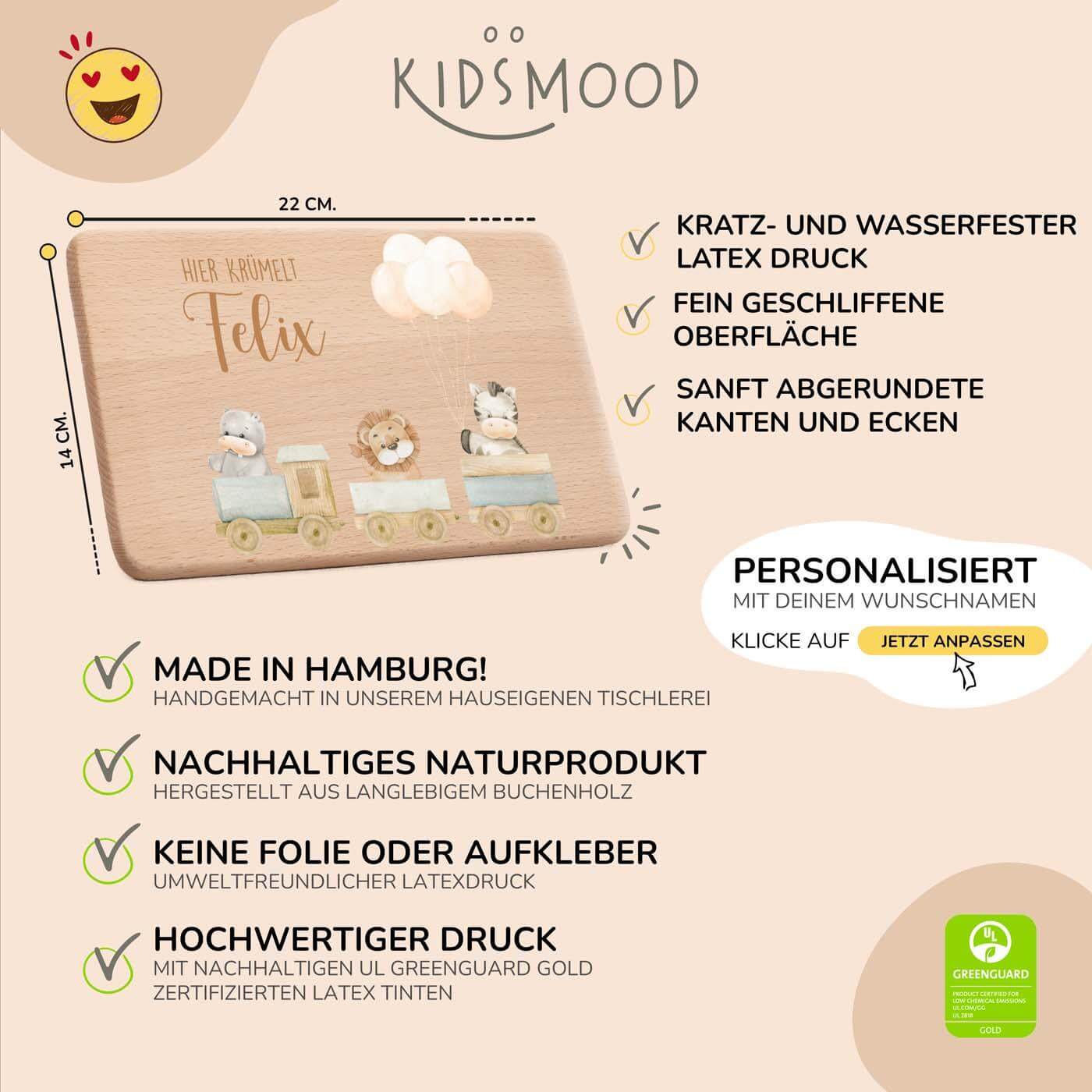 detailansicht der gravur auf dem frühstücksbrettchen mit tier-eisenbahn