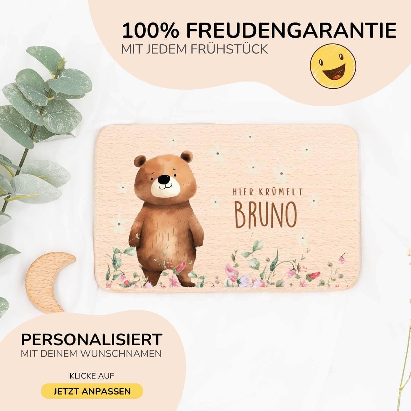 nahaufnahme des frühstücksbrettchens mit bär und blumenwiese motiv