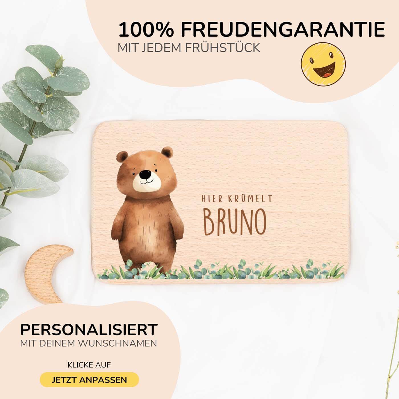 nahaufnahme des frühstücksbrettchens mit bär und regenbogen motiv