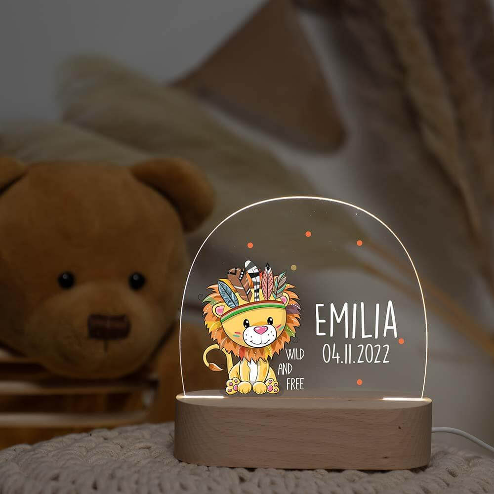 handcrafted night lamp with löwe, feathers, and wild & free engraving