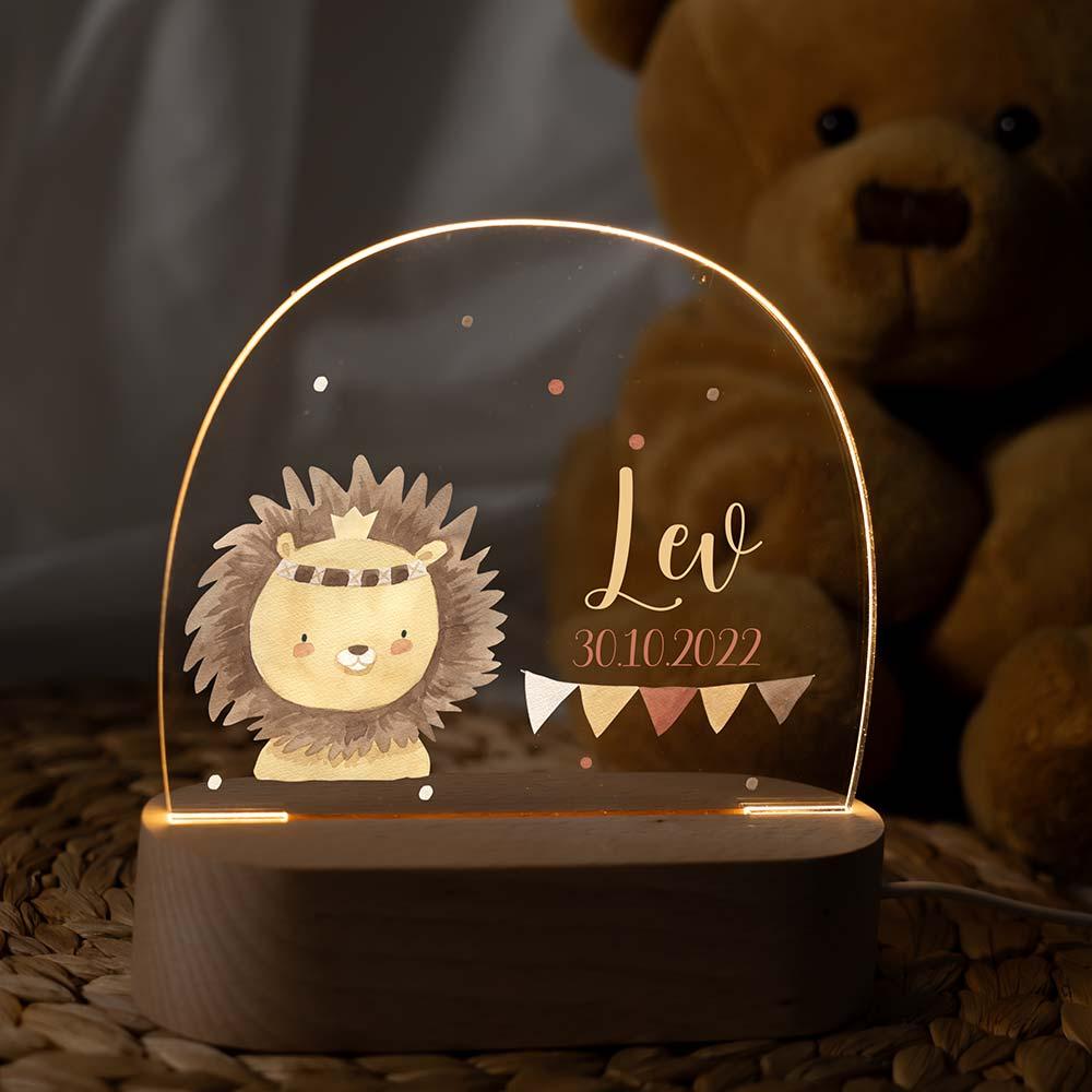 handcrafted night lamp with baby löwe, dots, garland engraving