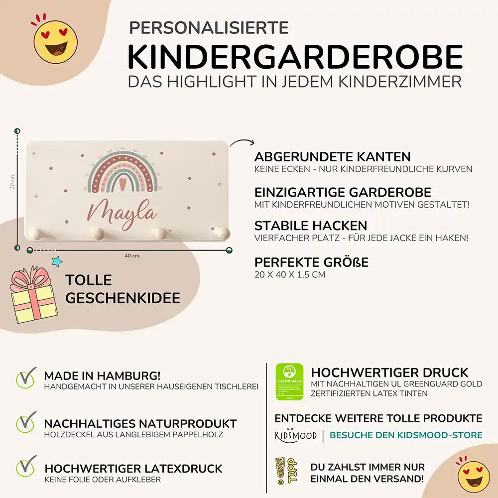 detailansicht der gravierten regenbogen und herz motive auf der holzgarderobe