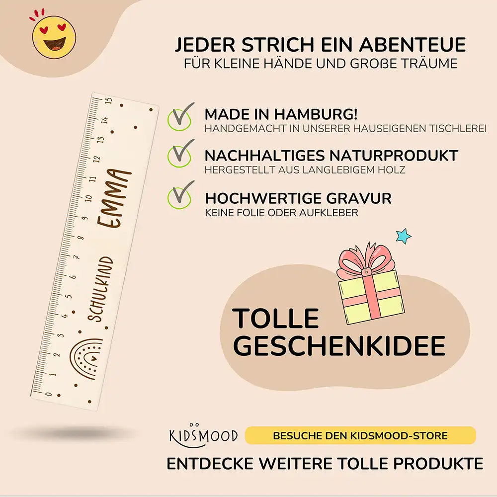 detailansicht des gravierten regenbogen motivs auf dem holzlineal