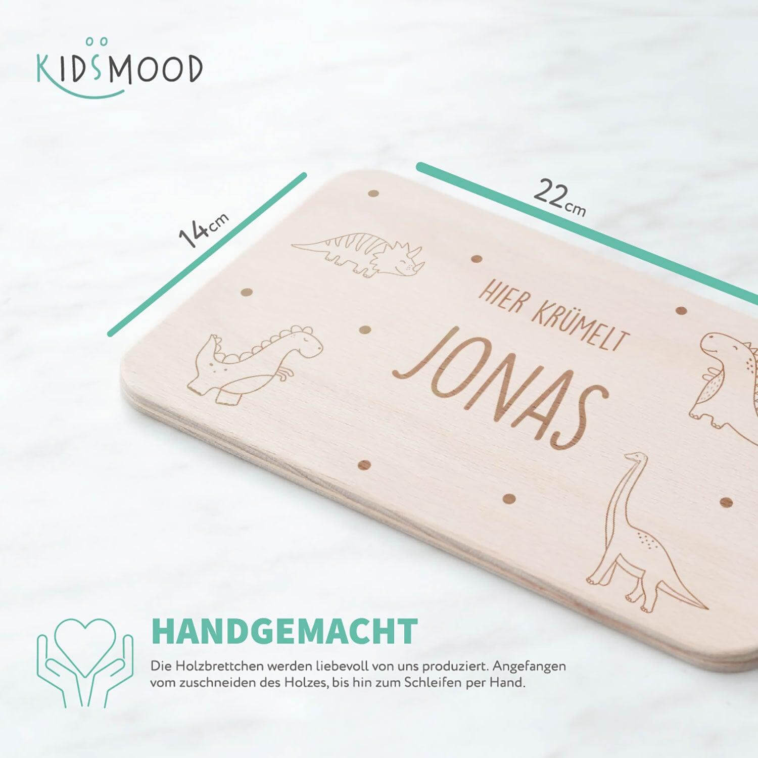 detailed view of dinosaur design on breakfast board