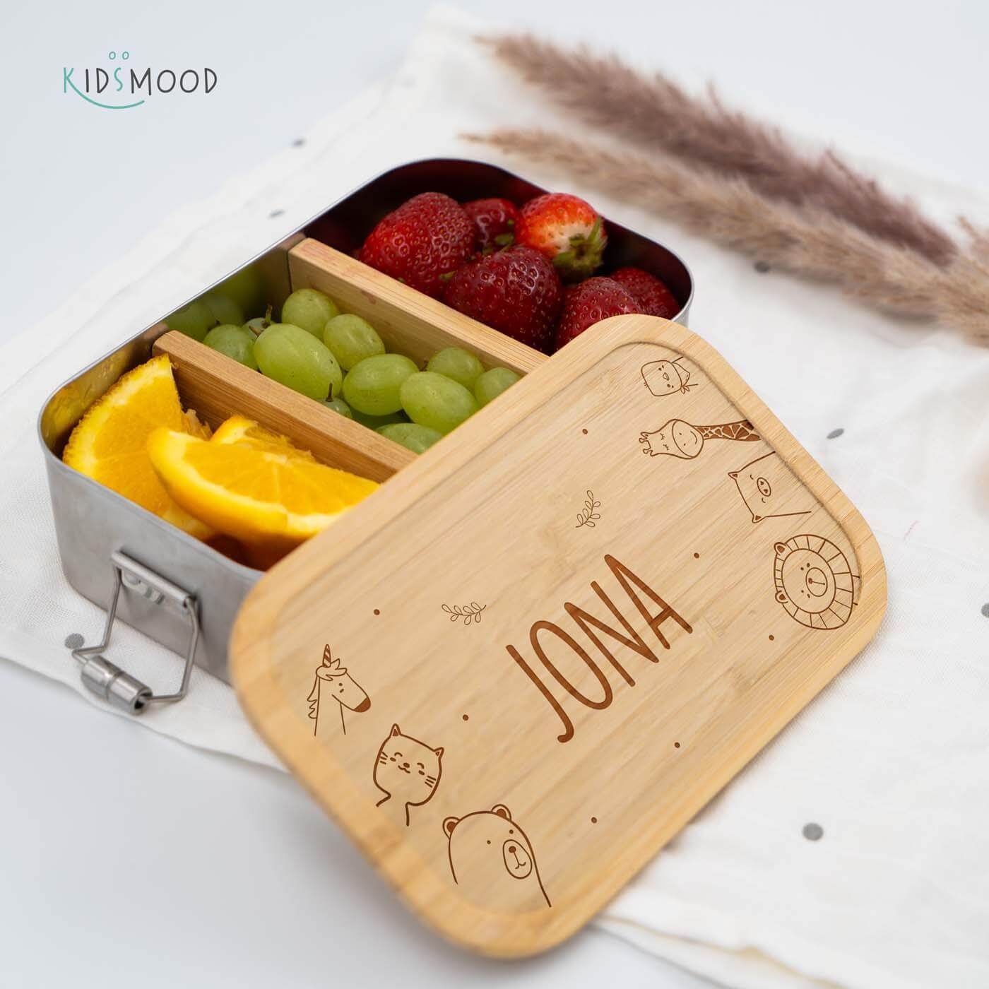 close-up of lunchbox with animal family motif