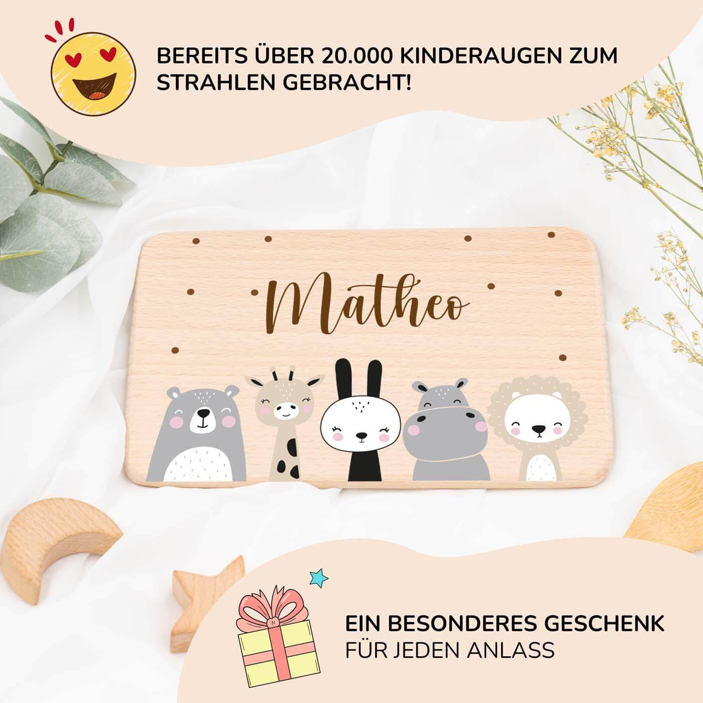 handgefertigtes frühstücksbrettchen mit tierfamilie gravur