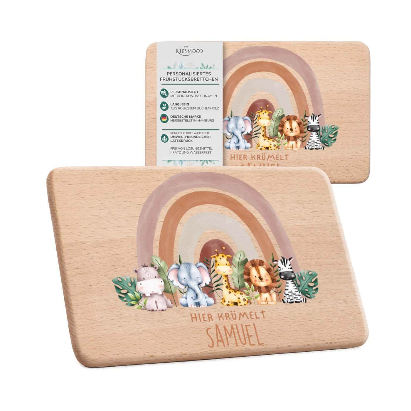 nahaufnahme des frühstücksbrettchens mit tierfamilie-regenbogen motiv