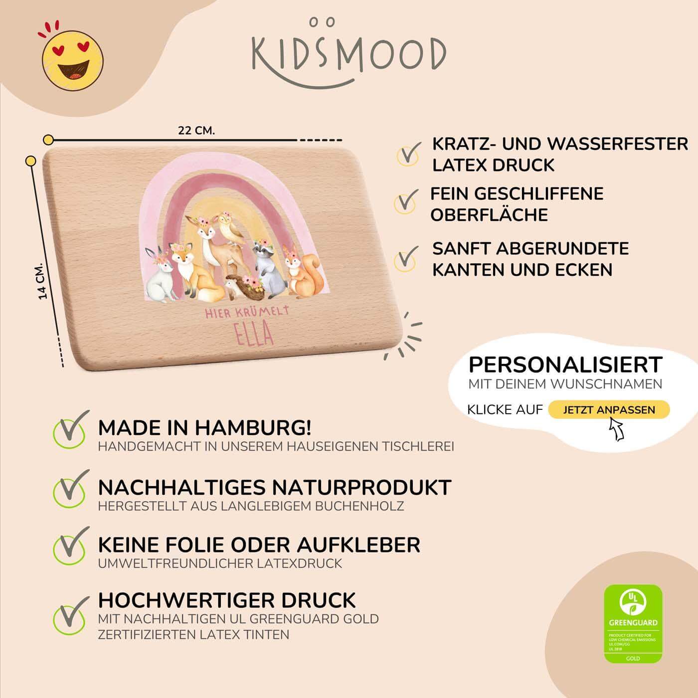 detailansicht der gravur auf dem frühstücksbrettchen mit regenbogen-waldtiere