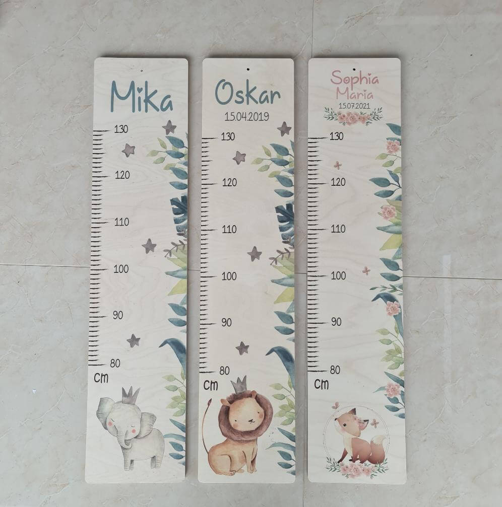 close-up of lion design on personalized height chart