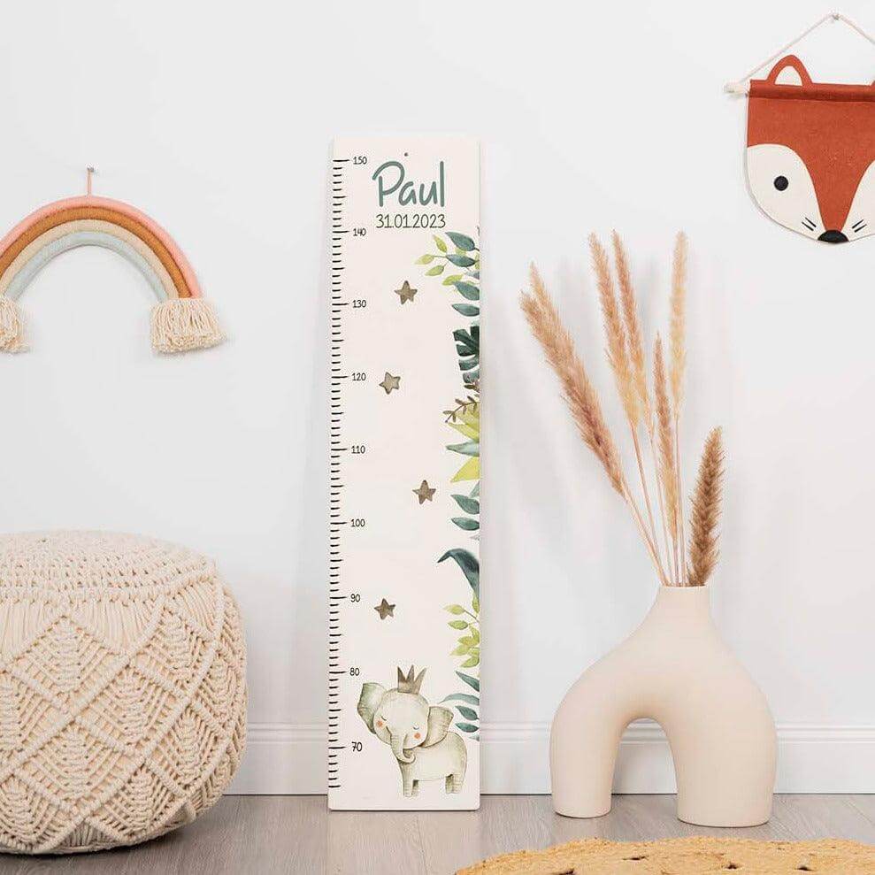 handcrafted height chart with elephant engraving