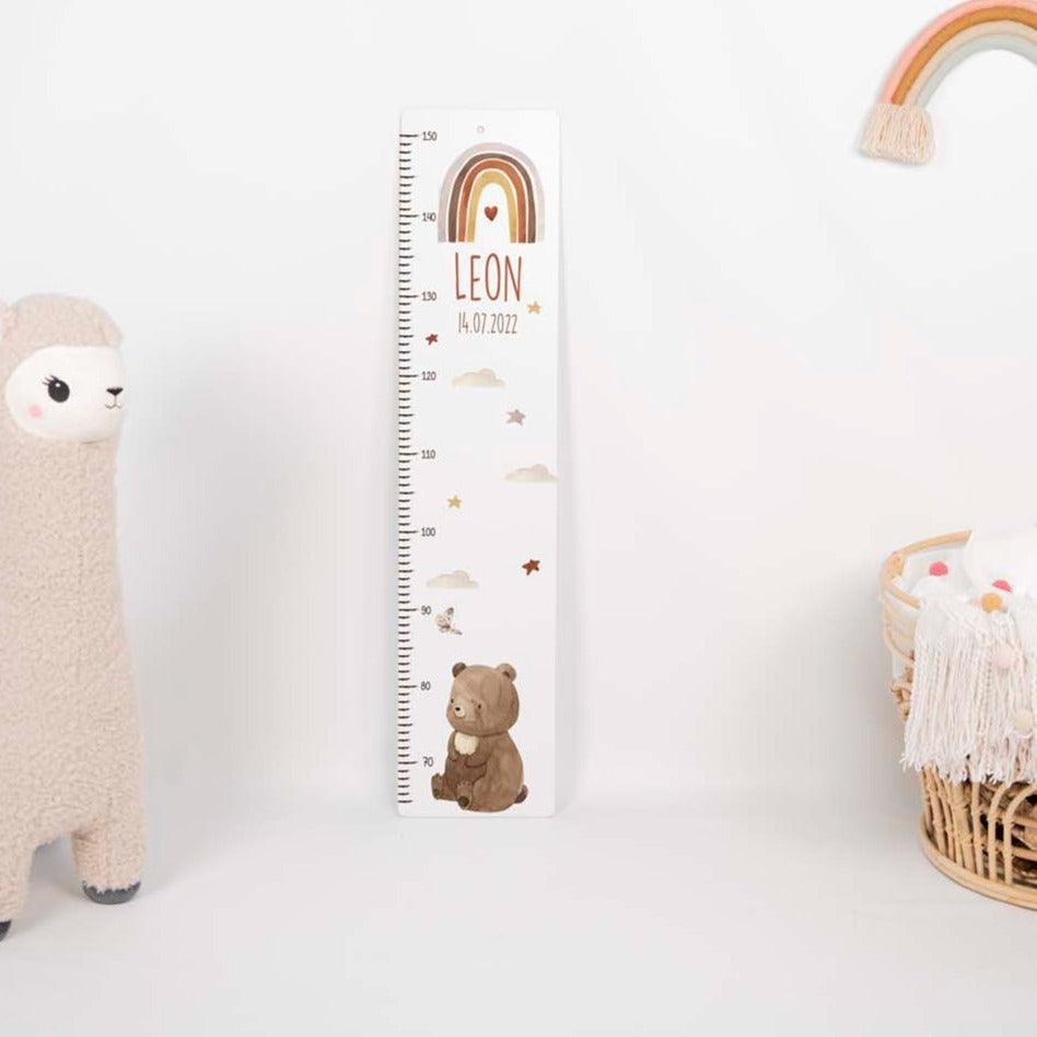 close-up of growth chart with bär boho motif