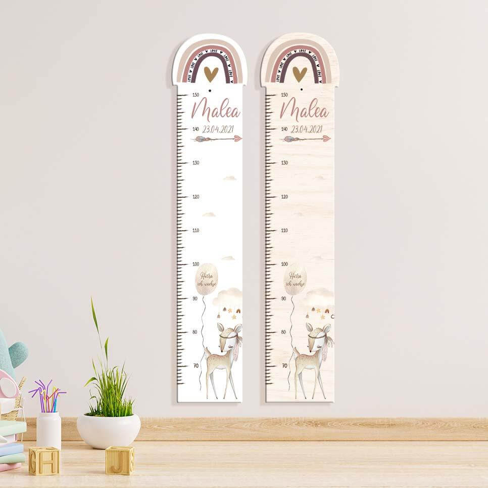 close-up of deer and rainbow design on personalized height chart