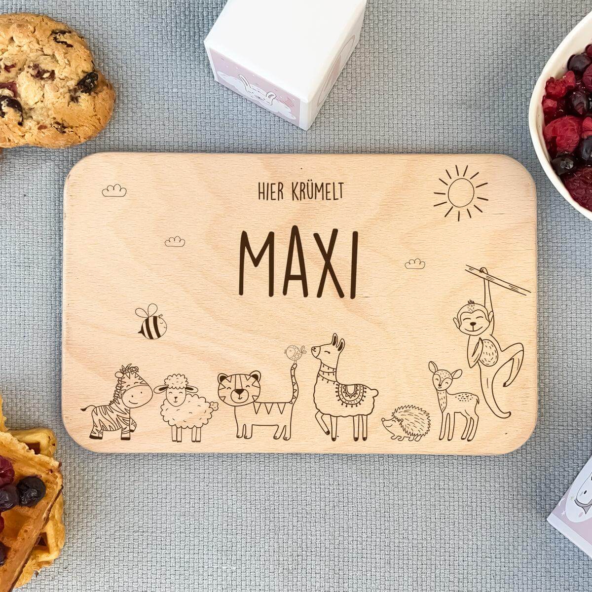 close-up of animal family design on personalized breakfast board