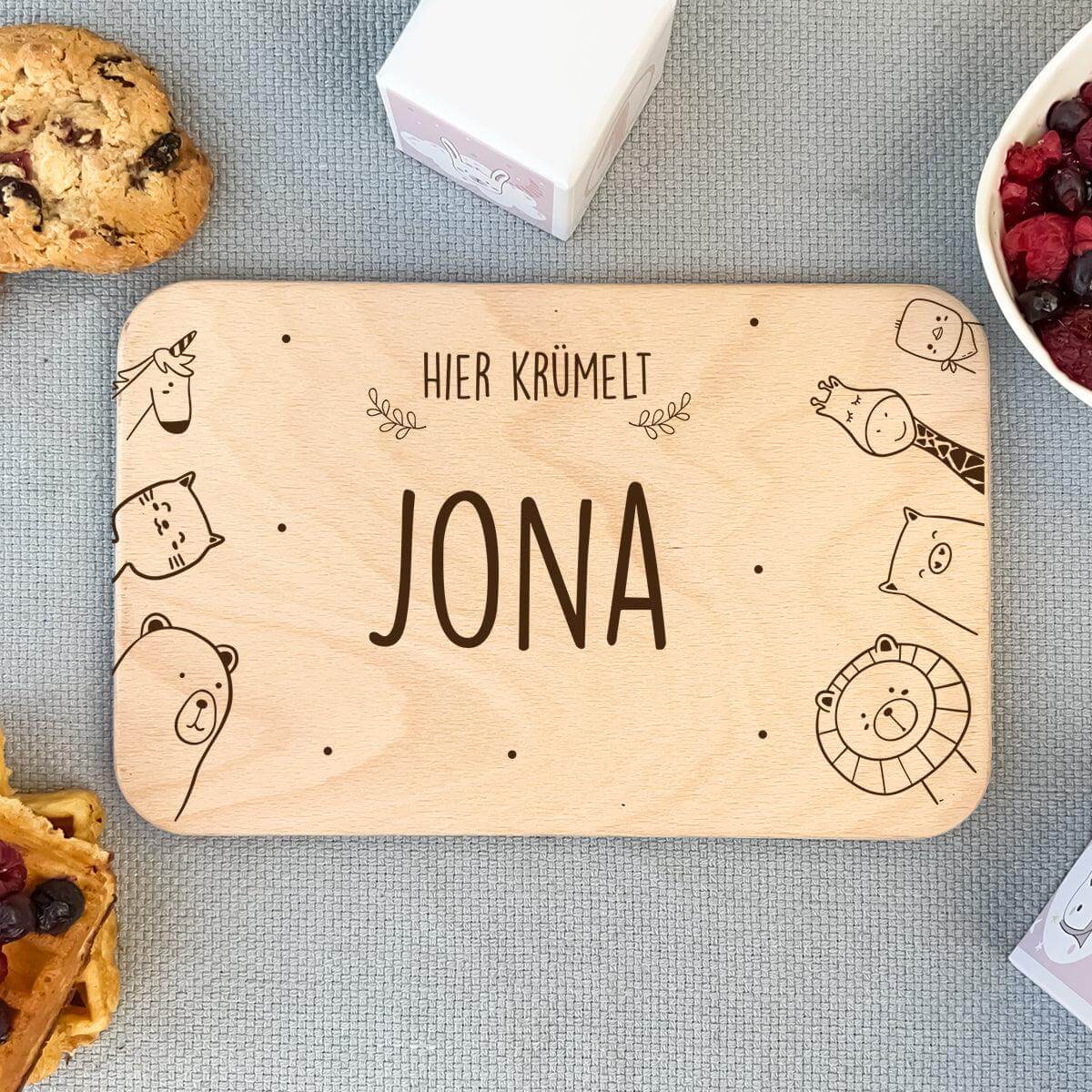 close-up of animal family design on personalized breakfast board